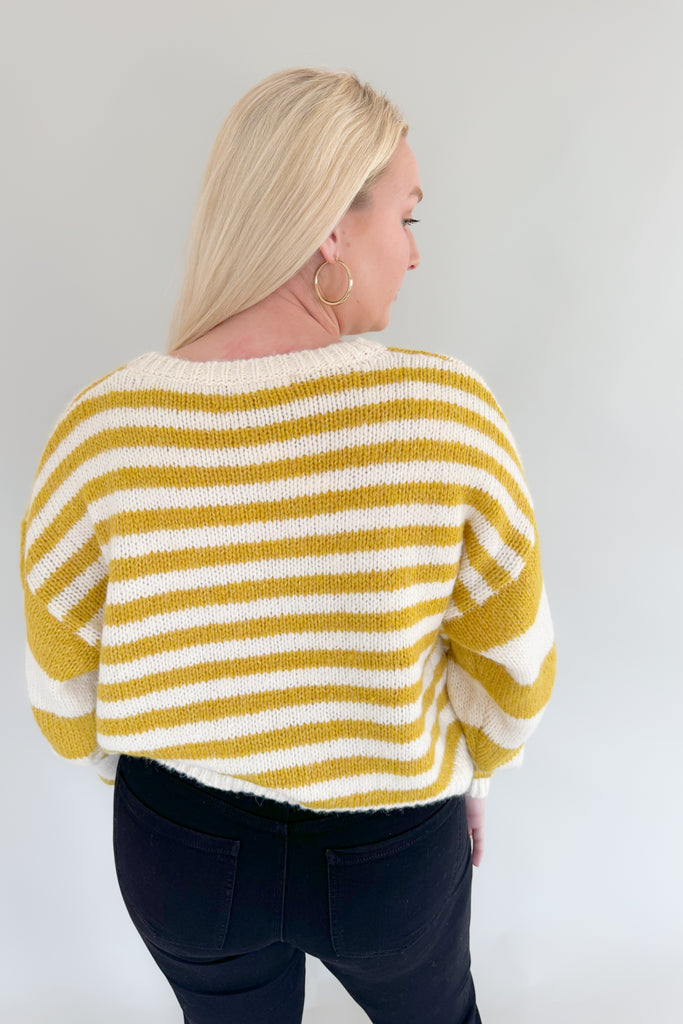Create a look that standout  this season with our Sammie Chartreuse + Ivory Sweater! This striped round neck sweater is made with an ultra soft lightweight  fabric, plus a relaxed fit for added comfort. It looks elevated without the fuss!