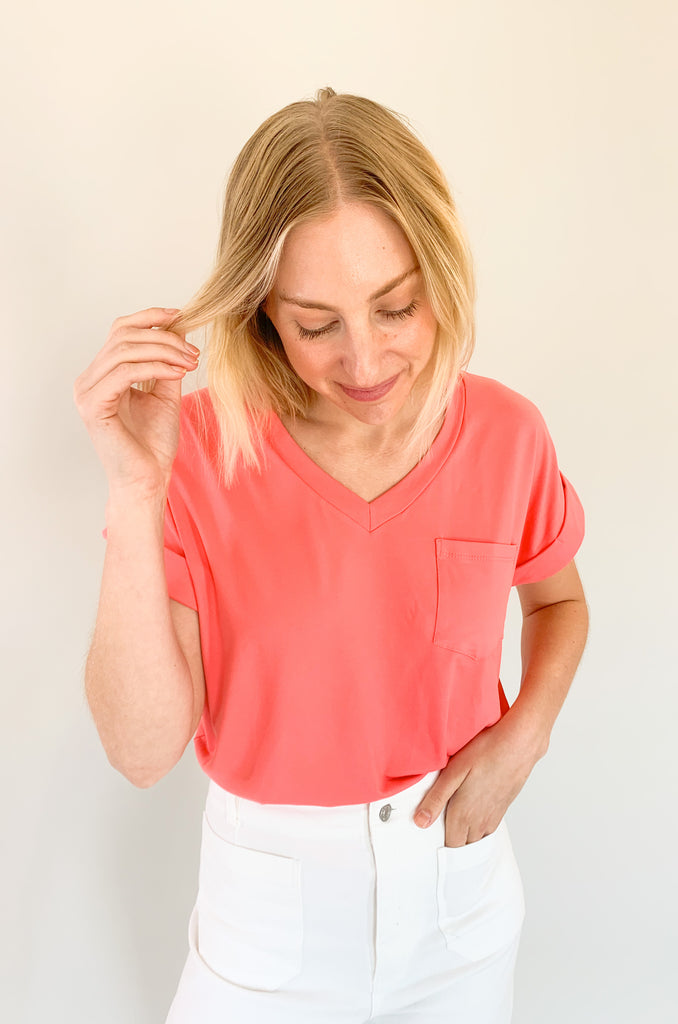 ultra soft short cuffed sleeve v neck pocket tee with stretchy fabric. Available in several colors. 