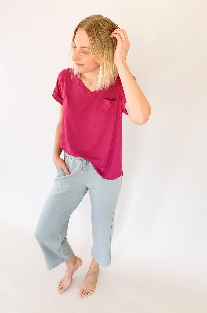 Stay comfortable and look stylish with the Scuba Crop Pant with Side Slits. Made from high-quality fabric, these relaxed-fitting pants feature an elastic drawstring waist and side slits at the ankle for enhanced comfort. The perfect choice for casual days all season long!