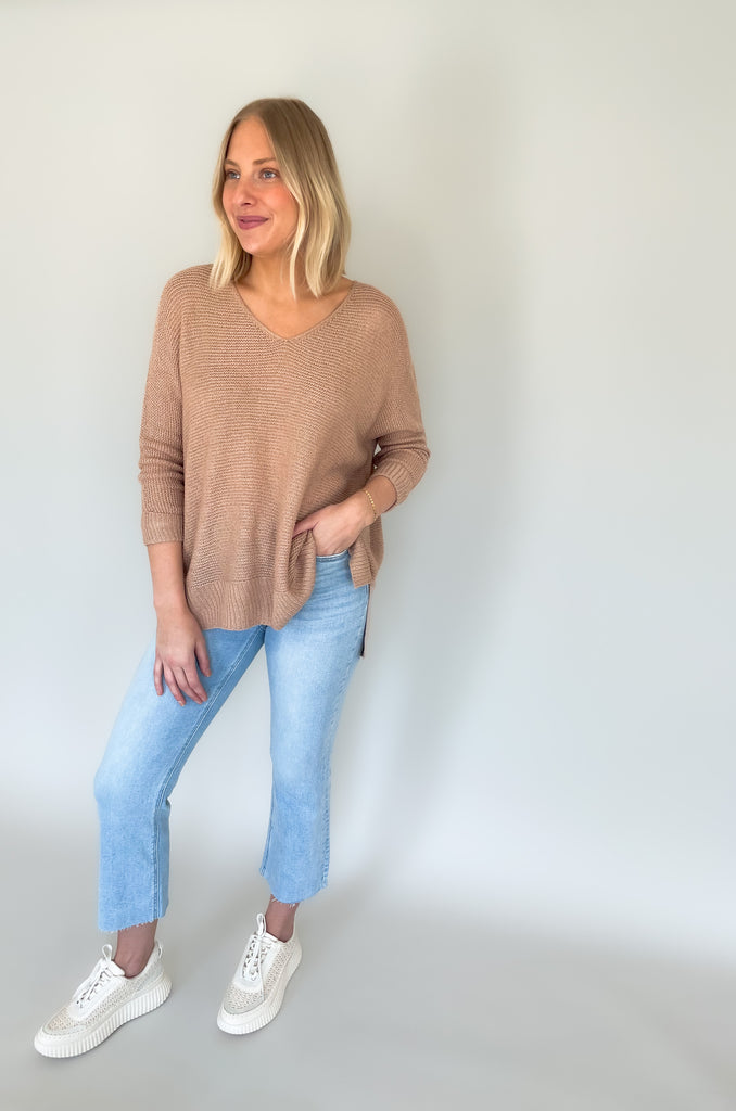 Look your best with the Ethel V Neck Sweater! Knitted from lightweight fabric, this stylish piece will keep you comfortable while making a statement. The v-neck cut adds a modern touch, Cuffed arms, and a flattering side slit ensures you can enjoy it all day long. It's oversized and so comfortable!