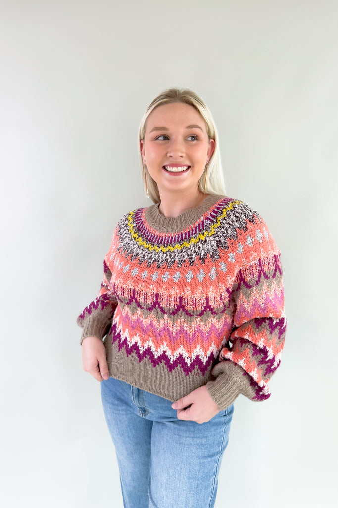 Refresh your wardrobe with the vibrant, textured knit Sia Fair Isle Multi Sweater! Made with abstract print stripes, it exudes confidence and playfulness. There is unique texture woven throughout too. The colors are so gorgeous with hints of purple, pink tones, and a pop of yellow. 