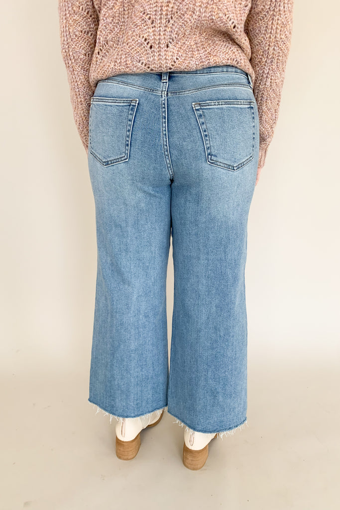 Our new Just Black Denim Slim Wide Leg pant might be our favorite wide leg! These high-waisted jeans are slim through the waist and open up past the thigh, creating a flattering and trendy look. Plus these jeans are made with our ultra-soft and stretchy fabric, which is comfortable for everyday wear. They fit like a dream and just look good, it's a win-win!