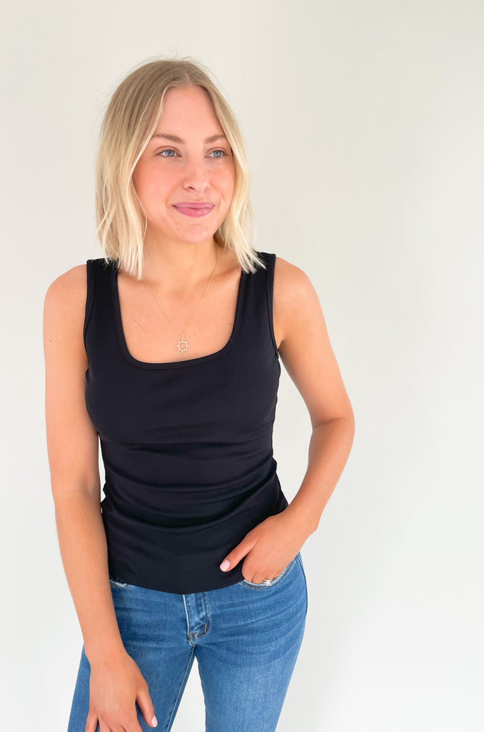 Square neck, white strap slinky tank top with elevated and stretchy fabric. Available in orange, pink, black or ivory. 