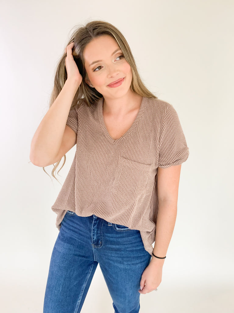 The Sloane Ribbed V Neck Pocket Tee is a great basic with elevated details! Because it is ribbed, the style looks really nice on its own or layered under your favorite pieces. The fabric is lightweight and comfortable too, perfect for busy days on the go. Enjoy several colors of this new favorite basic!