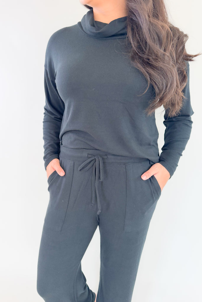 Unveil a world of lavish refinement with our enchanting Ultra Dream Cowl Neck Lounge Set. Revel in comfort and style effortlessly with its classically cozy cowl neck top, plus matching Ultra Dream long pant with convenient side pockets and elevated details. The black color is flattering and timeless, making this lounge set a winner for years to come. 