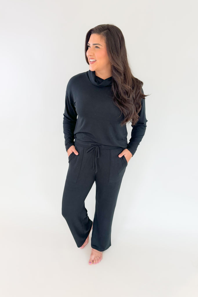 Unveil a world of lavish refinement with our enchanting Ultra Dream Cowl Neck Lounge Set. Revel in comfort and style effortlessly with its classically cozy cowl neck top, plus matching Ultra Dream long pant with convenient side pockets and elevated details. The black color is flattering and timeless, making this lounge set a winner for years to come. 