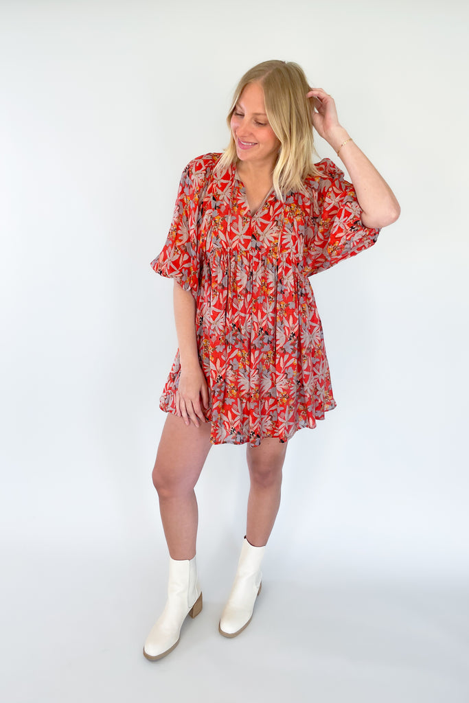 This mini dress will make a statement with its trendy red color and bold floral print! The Sophie Flowy Floral Mini Dress features a v-neckline, 3/4 balloon sleeves, and babydoll shape with flouncy bottom.