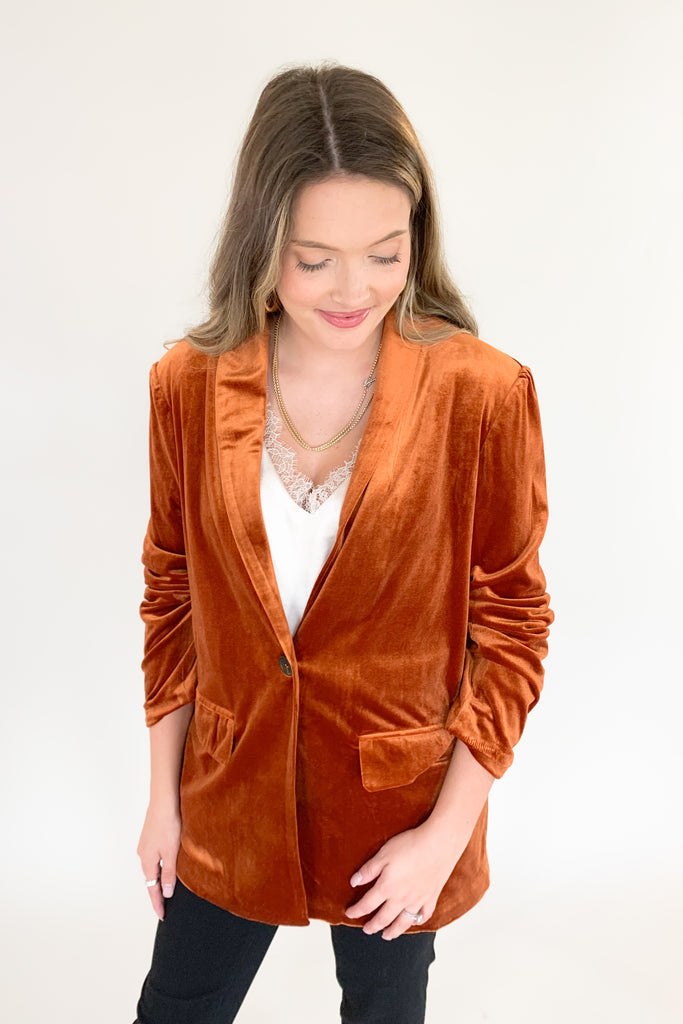 Make a statement in the Stella velvet blazer! With a timeless long-sleeve design and luxe velvet fabric, this blazer is a must-have for modern fashion lovers. Perfect for any occasion, but especially holidays. The versatility is endless too. Pull in colors of the teal blazer by pairing it with our Ecru Apricot Floral Long Sleeve Blouse, or pair anything with copper. 