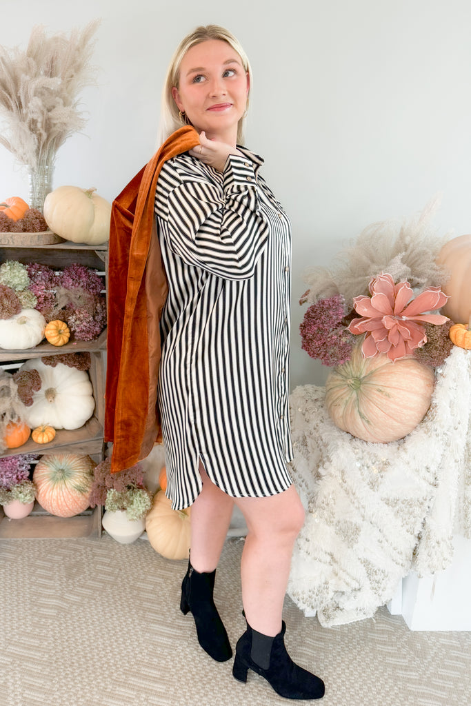 The Stripes on Stripe Button Up Shirt Dress is a fun style for fall and winter. The neutral stripes are timeless, making it a great wow-piece for the new season. The satin material is extremely soft and elevated too. If you want it more tailored, try adding a belt to complete your look! 