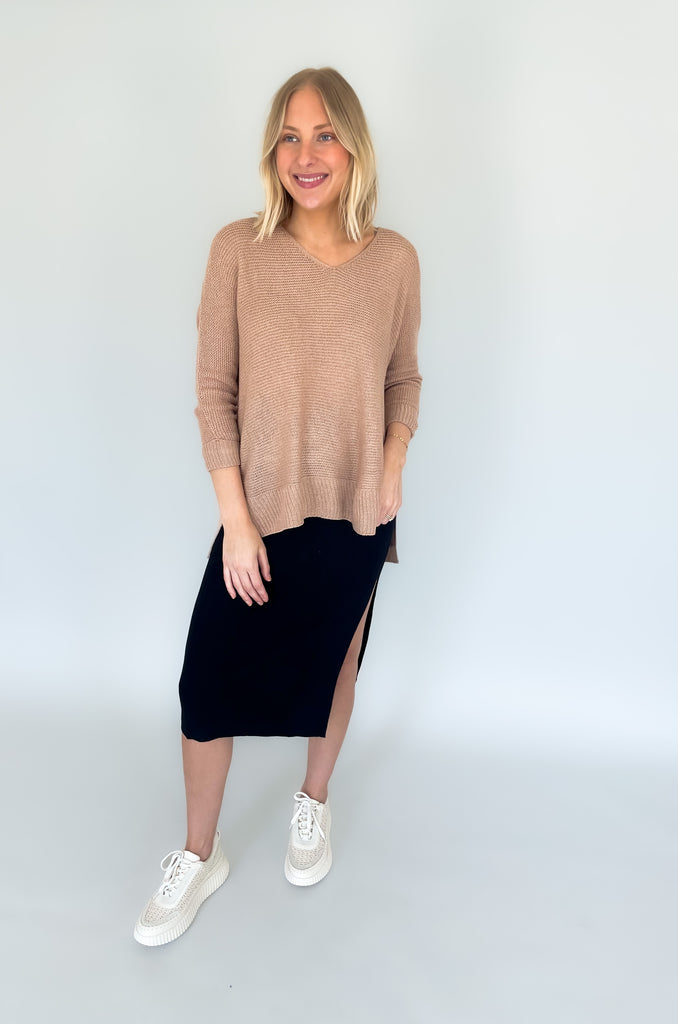 Look your best with the Ethel V Neck Sweater! Knitted from lightweight fabric, this stylish piece will keep you comfortable while making a statement. The v-neck cut adds a modern touch, Cuffed arms, and a flattering side slit ensures you can enjoy it all day long. It's oversized and so comfortable!