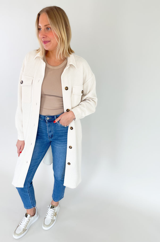 Long shacked coat with front pocks and button up style and collar-available in ivory and copper