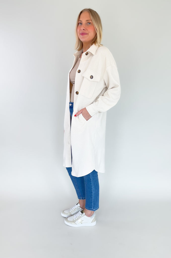 Long shacked coat with front pocks and button up style and collar-available in ivory and copper