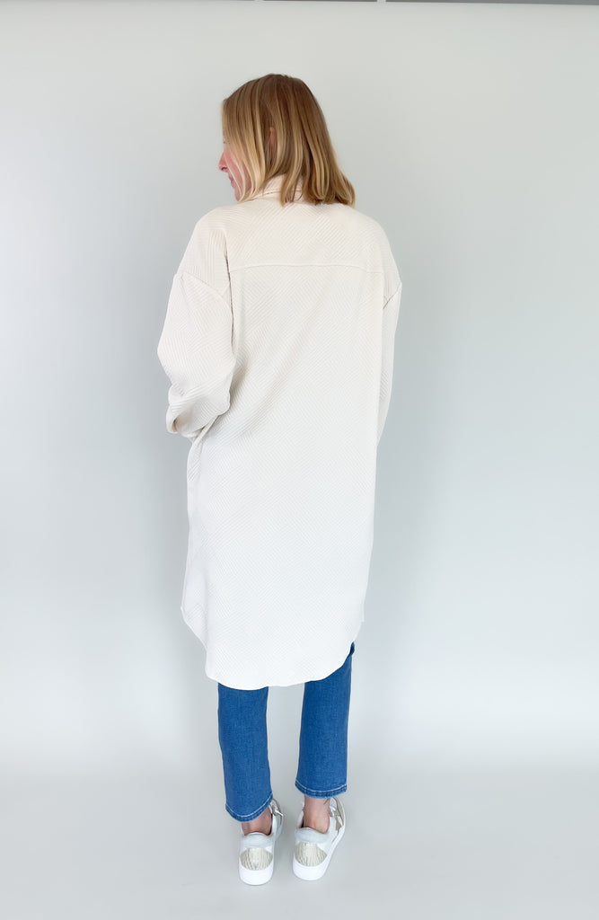 Long shacked coat with front pocks and button up style and collar-available in ivory and copper