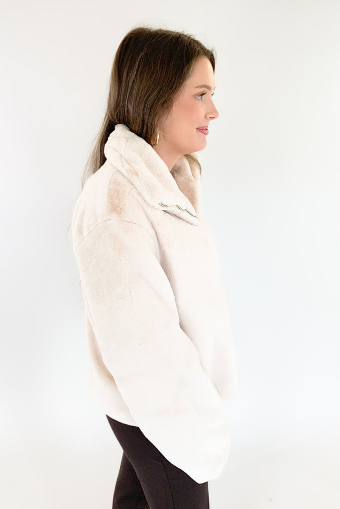 Stay warm and look great in the Teddy Cream Zip Jacket! Soft, creamy teddy material is perfectly paired with a satin lining for a stylish, yet cozy look. The front zip makes it hassle-free and perfect for any holiday occasion. 