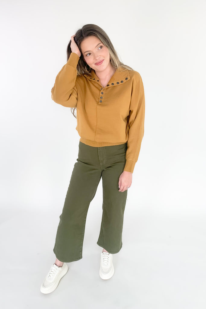 Trousers have taken over! This trending wide leg trouser from Just Black Denim is high-waisting and made with a thick fabric that molds to your body. With a relaxed fit through the knee and a wide open leg, you will be loving the comfort and look of this style! 
