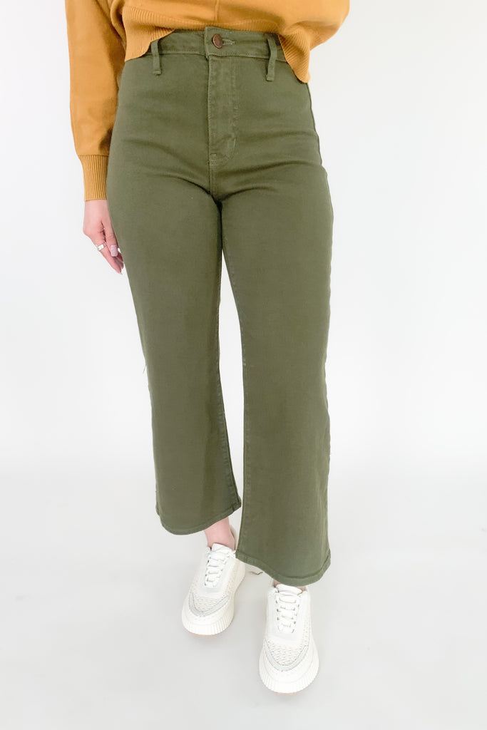 Trousers have taken over! This trending wide leg trouser from Just Black Denim is high-waisting and made with a thick fabric that molds to your body. With a relaxed fit through the knee and a wide open leg, you will be loving the comfort and look of this style! 