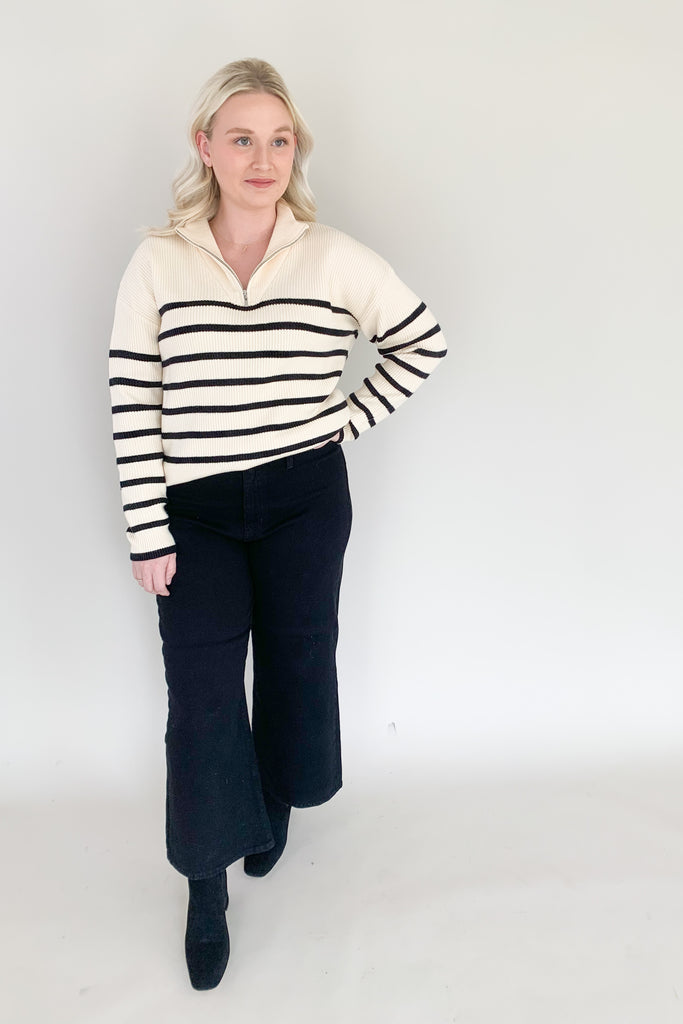 Trousers have taken over! This trending wide leg trouser from Just Black Denim is high-waisting and made with a thick fabric that molds to your body. With a relaxed fit through the knee and a wide open leg, you will be loving the comfort and look of this style! 