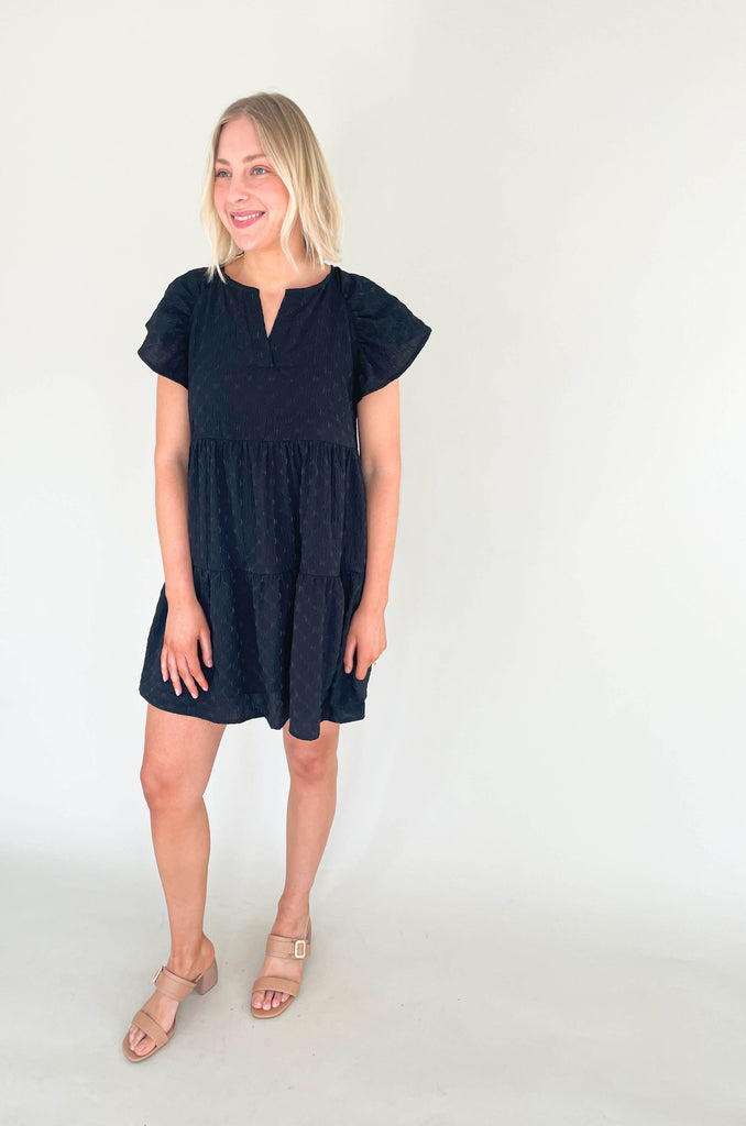 Introducing the Too Perfect Flare Sleeve Tiered Dress! Make a statement and stand out in this textured dress that flaunts your style and shows off your personality. Featuring a v-neckline and tiered design, it will make you feel like a million bucks. Available in black or yellow if you dare to be bold. This dress also features a built-in liner for more coverage. 