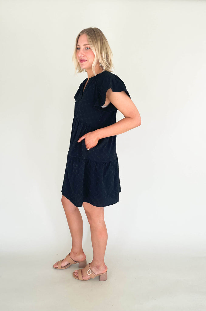 Introducing the Too Perfect Flare Sleeve Tiered Dress! Make a statement and stand out in this textured dress that flaunts your style and shows off your personality. Featuring a v-neckline and tiered design, it will make you feel like a million bucks. Available in black or yellow if you dare to be bold. This dress also features a built-in liner for more coverage. 