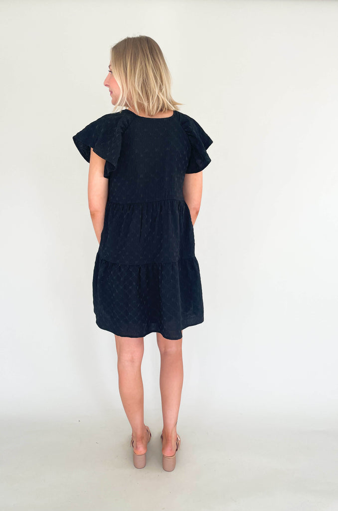 Introducing the Too Perfect Flare Sleeve Tiered Dress! Make a statement and stand out in this textured dress that flaunts your style and shows off your personality. Featuring a v-neckline and tiered design, it will make you feel like a million bucks. Available in black or yellow if you dare to be bold. This dress also features a built-in liner for more coverage. 