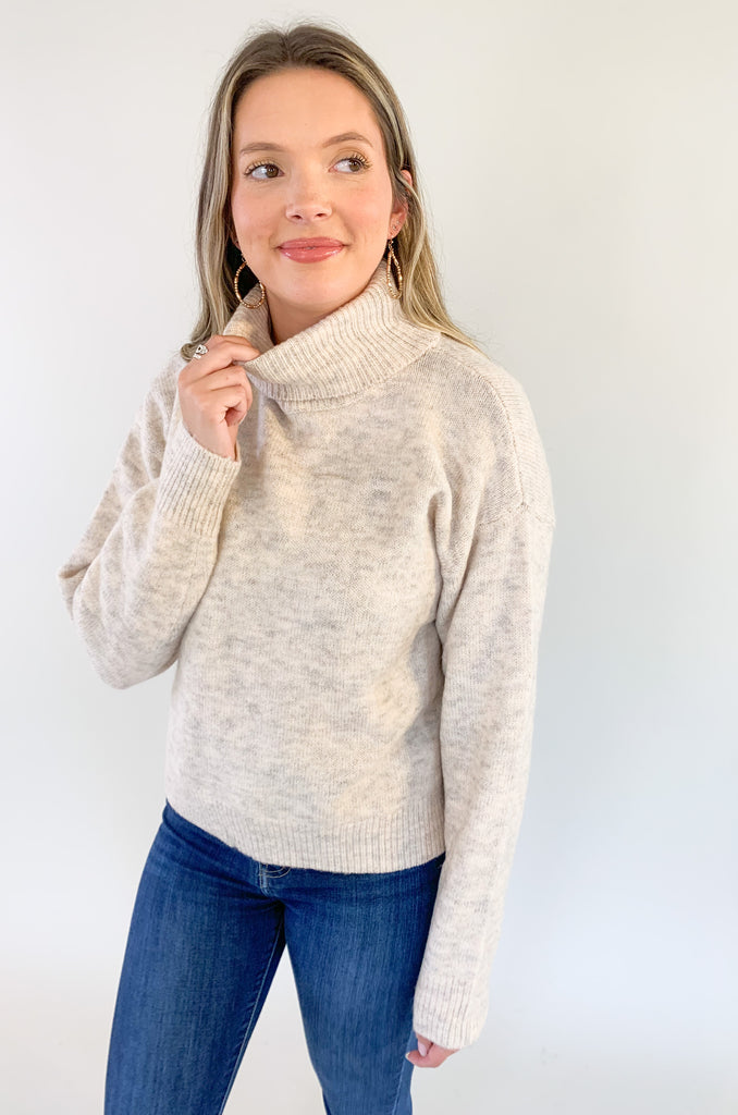 Stay warm and stylish this season with our Molly Bracken Turtleneck Drop Shoulder Sweater! Crafted with a textured, super soft fabric, this sweater features a classic, flattering fit, perfect for any wardrobe. Keep cozy and chic all season long.