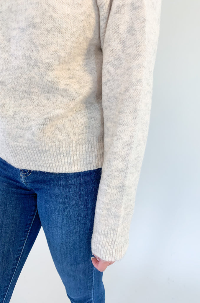 Stay warm and stylish this season with our Molly Bracken Turtleneck Drop Shoulder Sweater! Crafted with a textured, super soft fabric, this sweater features a classic, flattering fit, perfect for any wardrobe. Keep cozy and chic all season long.