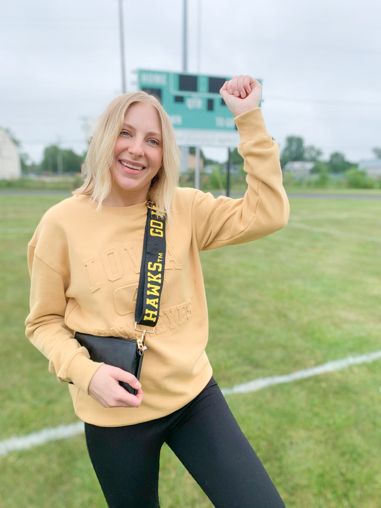 The U of I Vintage 81 Emboss Crewneck is designed with a fun, vintage-inspired look that's cute and cozy for game day! This classic crewneck features a raised embossed logo on the front that's so unique. You cannot find crewnecks like these just anywhere! Add some of our favorite Iowa accessories and you are ready for your next tailgate.