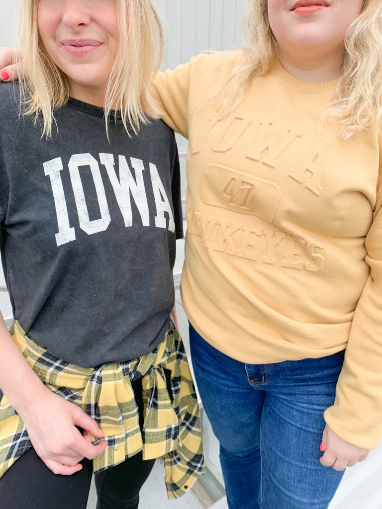 The U of I Vintage 81 Emboss Crewneck is designed with a fun, vintage-inspired look that's cute and cozy for game day! This classic crewneck features a raised embossed logo on the front that's so unique. You cannot find crewnecks like these just anywhere! Add some of our favorite Iowa accessories and you are ready for your next tailgate.