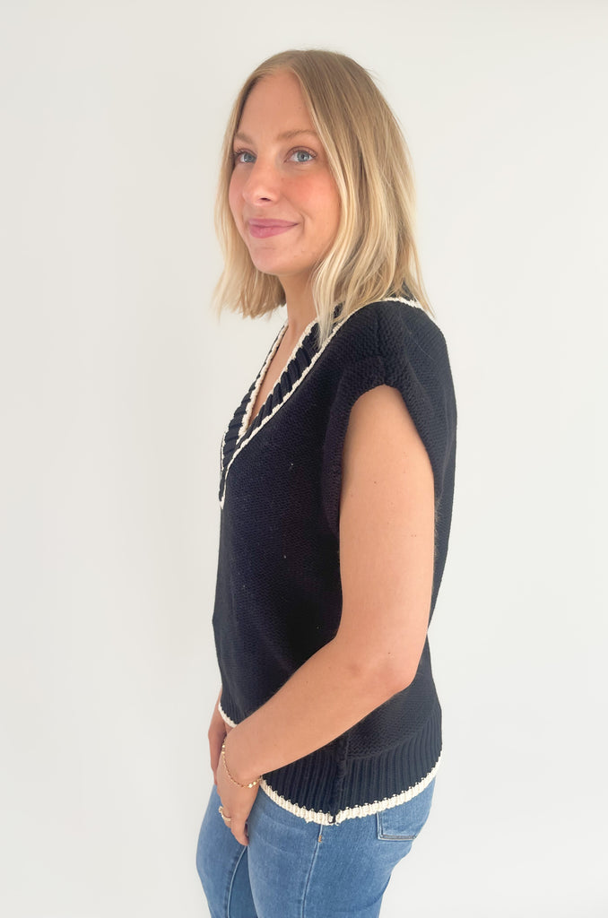 The Elan V Neck Varsity Sweater Vest is so chic and elevated! We love the cozy thick sweater material and contrast details. Round the v-neckline and bottom hem, there is contrast stitching. 