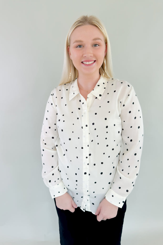 This stunning Vanilla Dot Button Front Long Sleeve Blouse is made from soft satin fabric for a luxurious feel. Made by Liverpool apparel, you know the quality and texture is amazing. Featuring an eye-catching polka dot design and smart button front, this stylish blouse is perfect for work or special occasions. 