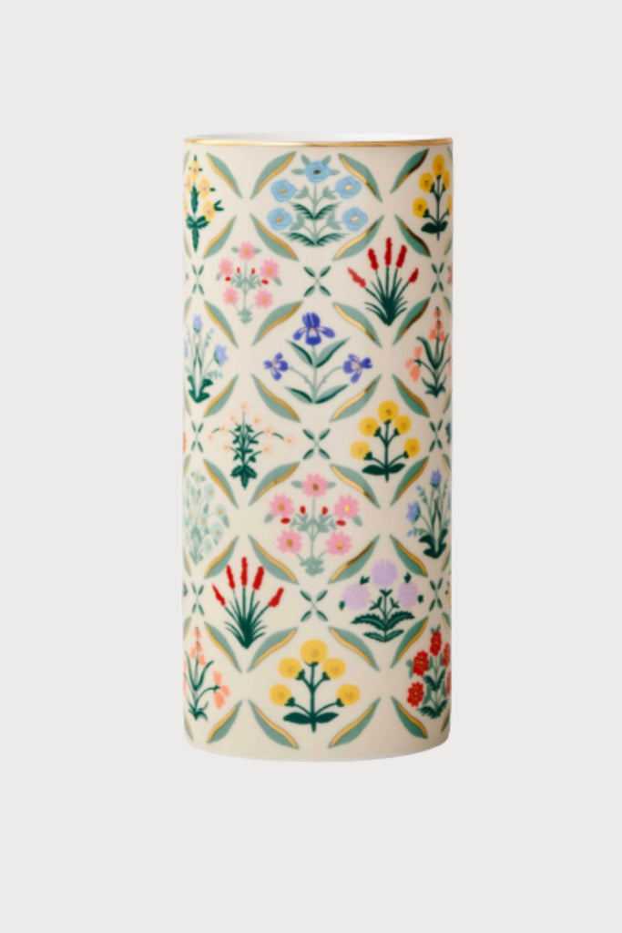 Flowers for your flowers, this Rifle Paper Co porcelain cylinder vase features the vintage–inspired Estee print with a gilded rim for extra shine! It's so beautiful and looks amazing throughout the seasons. 