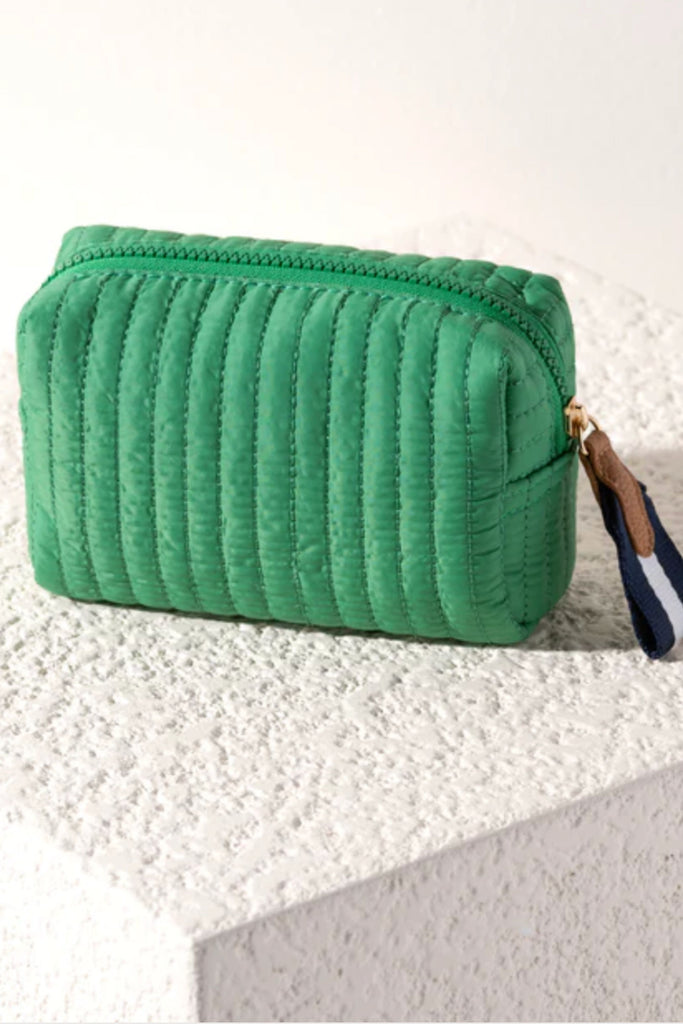 Perfect your on-the-go lifestyle with Shiraleah’s Ezra Small Boxy Cosmetic Pouch. This pouch features a sleek quilted body, and a boxy silhouette, perfectly pairing with Shiraleah’s Ezra Totes. Measuring L 7" × W 3" × H 4", and made from nylon, the Ezra Small Pouch is equipped with an inner zip and slip pocket, maximizing the space this pouch provides.