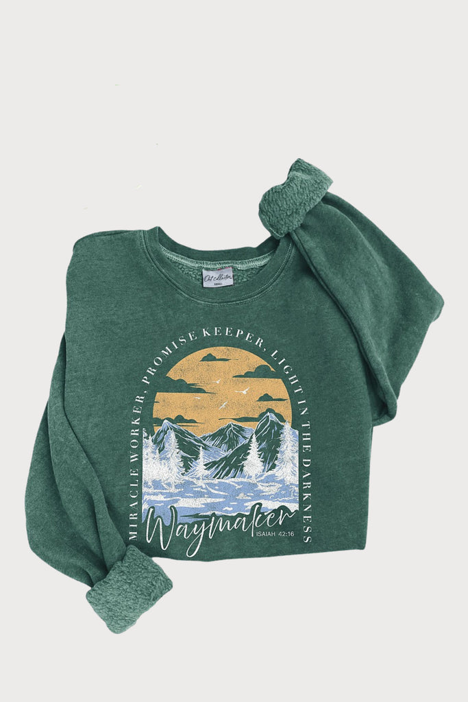 Spread positivity in this cozy Way Maker Mineral Washed Graphic Pullover! Its soft fleece interior and fun green coloring makes this style not only stand out, but also be your cozy new favorite. With a beautiful mountain sunset and inspirational quote, this sweatshirt is the perfect layering piece to express yourself. It also makes an incredible gift!