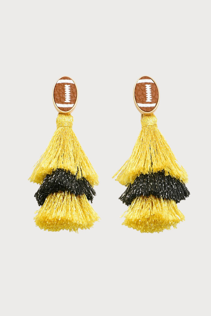The Glitter Football Helmet Black/Gold Earrings are perfect for Iowa game day! They are so unique with a little sparkle too. Connected by a gold ball stud, the earring dangles down into a helmet. It's such a fun design!