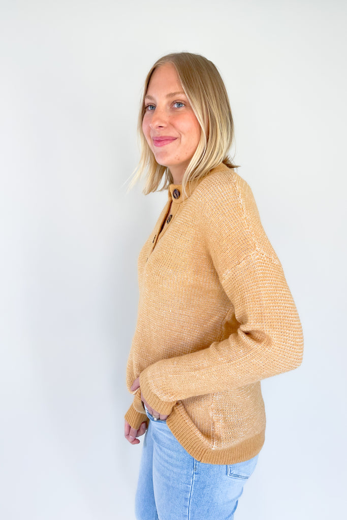 A perfect addition to your year-round wardrobe, the Wish Waffle Knit Henley offers a comfortable fit in a timeless style. Crafted with camel and white yarn and a 3/4 button up design, this henley offers a soft, stretchy feel that is perfect for everyday wear. 