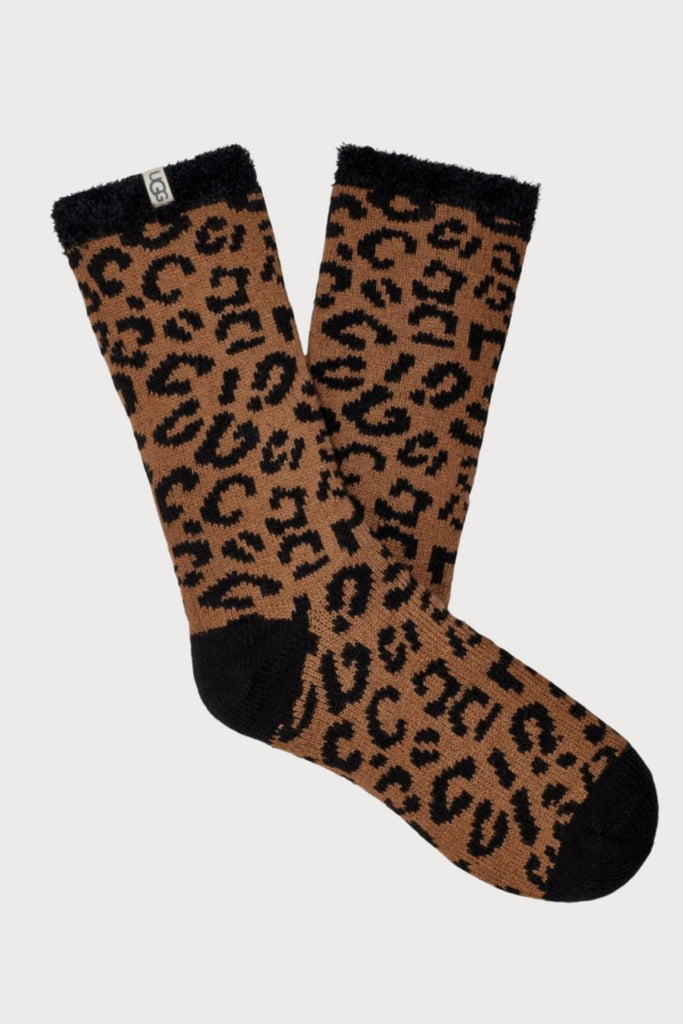 The UGG Women's Josephine Fleece Lined Socks  are lined with our ultra-soft fleece! This luxurious sock combines the world-renowned feeling of UGG with a standout print for a wild statement. Wear them around the house or with boots for the ultimate self-care day.