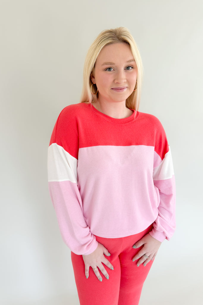 Look pretty in pink with the Z SUPPLY Colorblock LS Top. It features a lightweight cotton candy fabric and an easy-to-style silhouette for a cute and comfortable look. Perfect for holidays and gifting! Pair it with our matching [Z SUPPLY] Cross Over Flare Pant Candy Red to complete your look! 