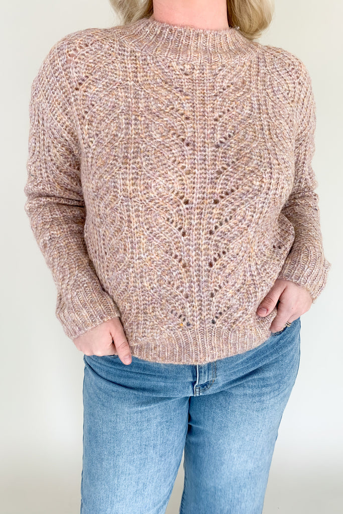 The [Z SUPPLY] Dove Sweater in Shadow Mauve is the epitome of cozy fall outfits. With an ultra soft marled yarn and gorgeous drop-needle cabling detail, this sweater will elevate your casual style. The mixed mauve colors are so pretty too!