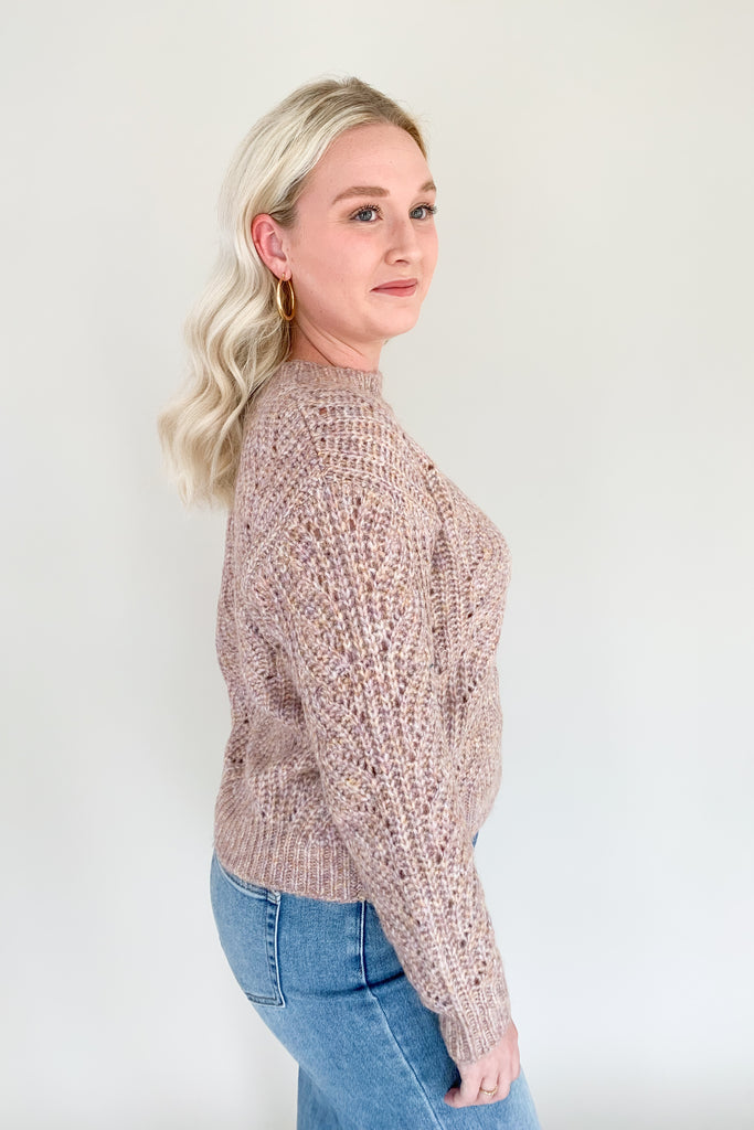 The [Z SUPPLY] Dove Sweater in Shadow Mauve is the epitome of cozy fall outfits. With an ultra soft marled yarn and gorgeous drop-needle cabling detail, this sweater will elevate your casual style. The mixed mauve colors are so pretty too!