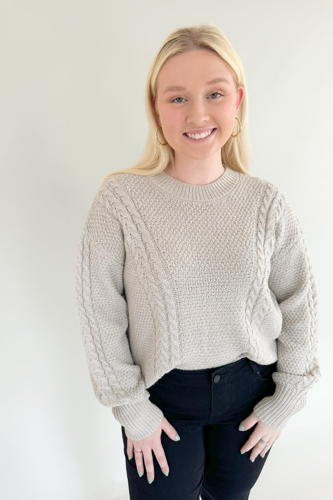 Add some sparkle into your wardrobe this season with this new chunky sweater, made of metallic yarns. The luxe [Z SUPPLY] Eternal Metallic Cable Sweater in Dove has a drop shoulder, crew neckline, and relaxed sleeves that bloussant. This sweater is just as perfect for a night out or a day running errands.