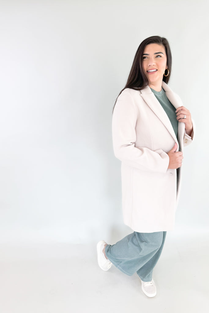 Make an elevated and cool statement with Becca's Beige Double Button Coat! This timeless, medium-weight coat is perfect for any season from fall-spring with its neutral color. It's soft and cozy, while polishing up any look! 