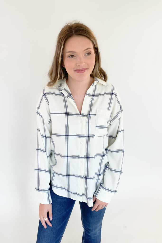 The [Z SUPPLY] River Plaid Button Up is a classic windowpane plaid top that's ultra cozy! We love the neutral black and white windowpane plaid because it will pair well with everything. As you know, this brand is so luxe and amazing quality. With it's built to last fabrication, it will be an everyday staple for fall.
