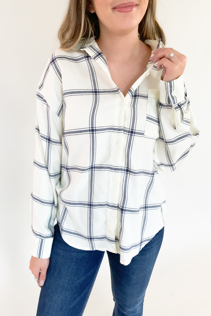 The [Z SUPPLY] River Plaid Button Up is a classic windowpane plaid top that's ultra cozy! We love the neutral black and white windowpane plaid because it will pair well with everything. As you know, this brand is so luxe and amazing quality. With it's built to last fabrication, it will be an everyday staple for fall.