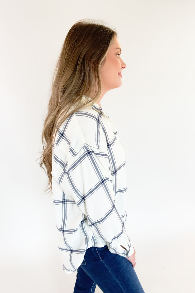The [Z SUPPLY] River Plaid Button Up is a classic windowpane plaid top that's ultra cozy! We love the neutral black and white windowpane plaid because it will pair well with everything. As you know, this brand is so luxe and amazing quality. With it's built to last fabrication, it will be an everyday staple for fall.