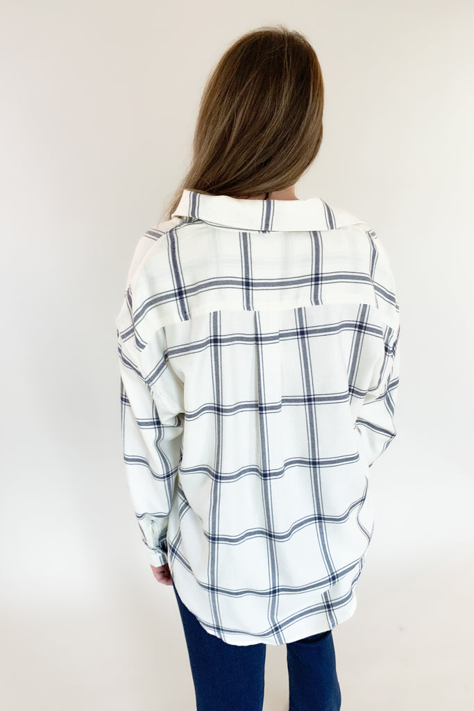The [Z SUPPLY] River Plaid Button Up is a classic windowpane plaid top that's ultra cozy! We love the neutral black and white windowpane plaid because it will pair well with everything. As you know, this brand is so luxe and amazing quality. With it's built to last fabrication, it will be an everyday staple for fall.