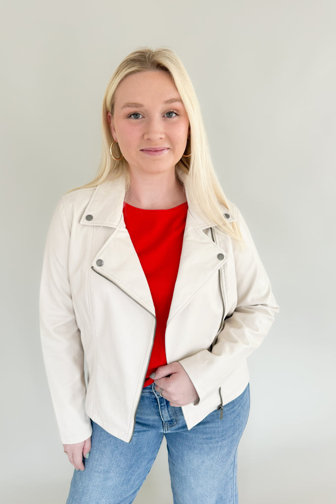 Add an instant edginess to any look with this faux leather statement jacket. The fully lined [Z SUPPLY] Trina Moto Jacket in Ecru is made using Z SUPPLYS vegan faux leather fabric and features an asymmetrical zip front, zippered sleeves, and functional welt pockets for a cool look you'll wanna wear all season. 
