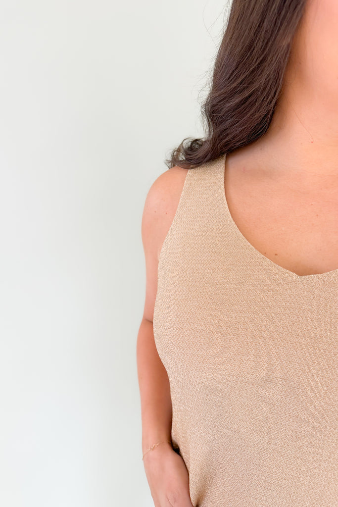 Dress up and shine for the night in the [Z SUPPLY] Vagabond Sparkle Tank! This lightweight, stretchy fabric is perfect for adding a sparkle to your outfit. Look stunning and feel confident for the evening. Layer it under your favorite blazer or cardigan to complete the look!
