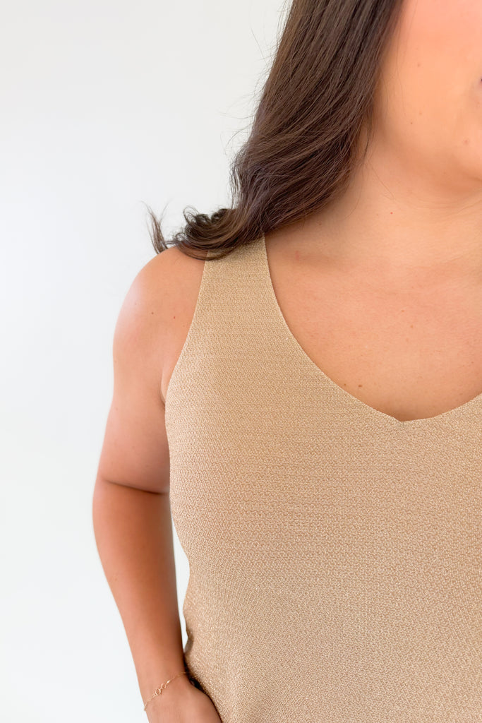 Dress up and shine for the night in the [Z SUPPLY] Vagabond Sparkle Tank! This lightweight, stretchy fabric is perfect for adding a sparkle to your outfit. Look stunning and feel confident for the evening. Layer it under your favorite blazer or cardigan to complete the look!