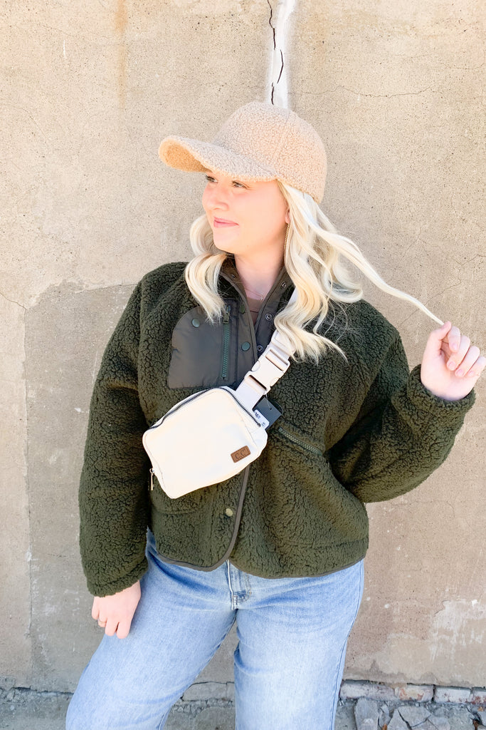 The Boucle Baseball Cap is a cute & trendy style that takes a casual hat to the next level! They are anything but boring, featuring a unique sherpa texture and cozy fit. These hats have an adjustable back too. 