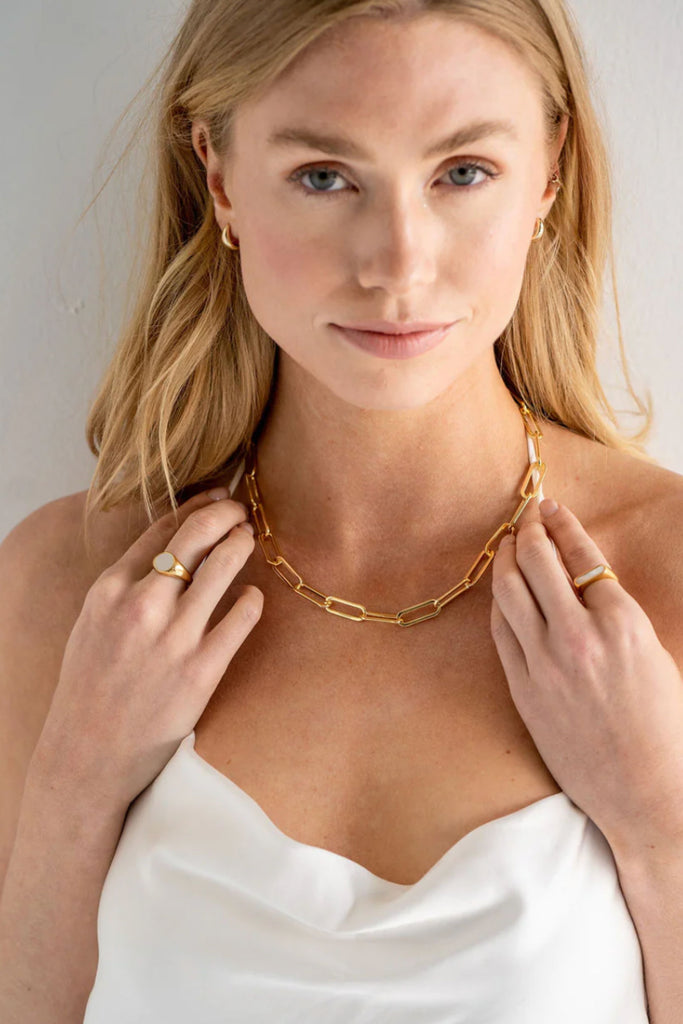 We love a chunky paperclip necklace! It makes a statement, but is not too flashy. It perfectly elevates any outfit. Made by Brenda Grands, this style has amazing quality and design. 